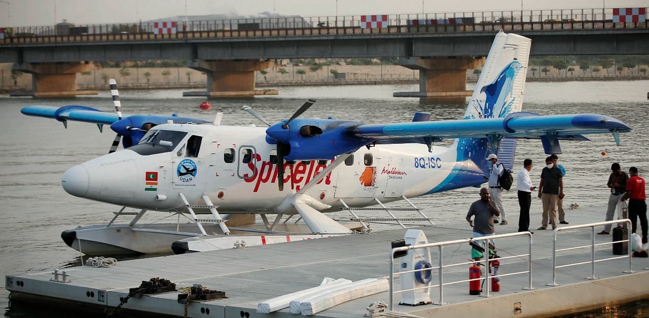 India’s first seaplane parked near a jetty, ahead of its inauguration by Prime Minister Narendra Modi, in Ahmedabad. Credit: PTI Photo