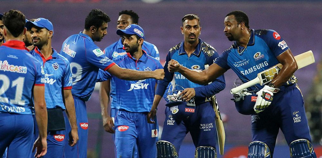 Kieron Pollard and R Ashwin greet each other at the end of the reverse fixture. Credit: iplt20.com, BCCI