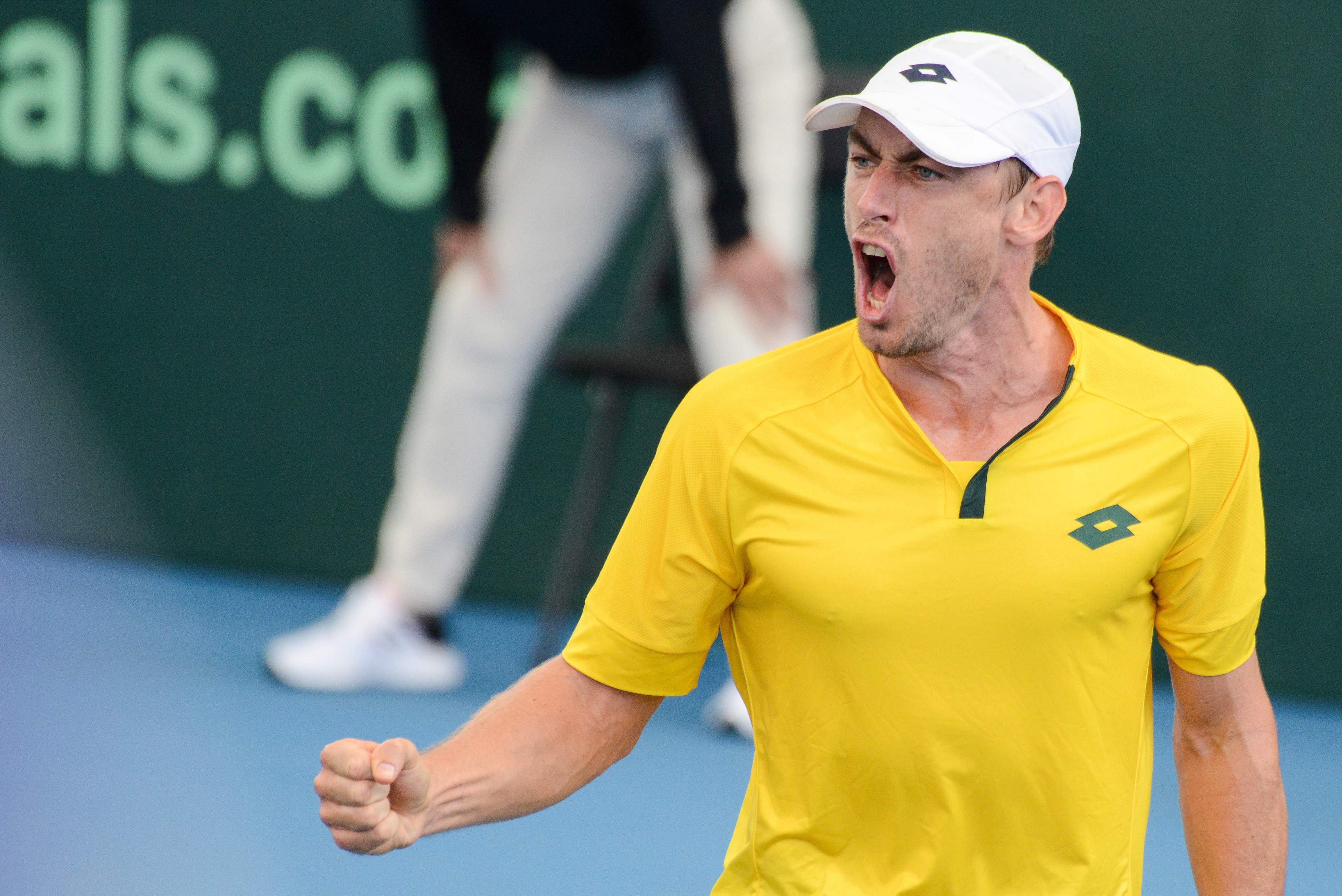 John Millman of Australia reacts to winning a point during his Davis Cup qualifying tie tennis match against Brazil in Adelaide on March 6, 2020. Credit: AFP Photo