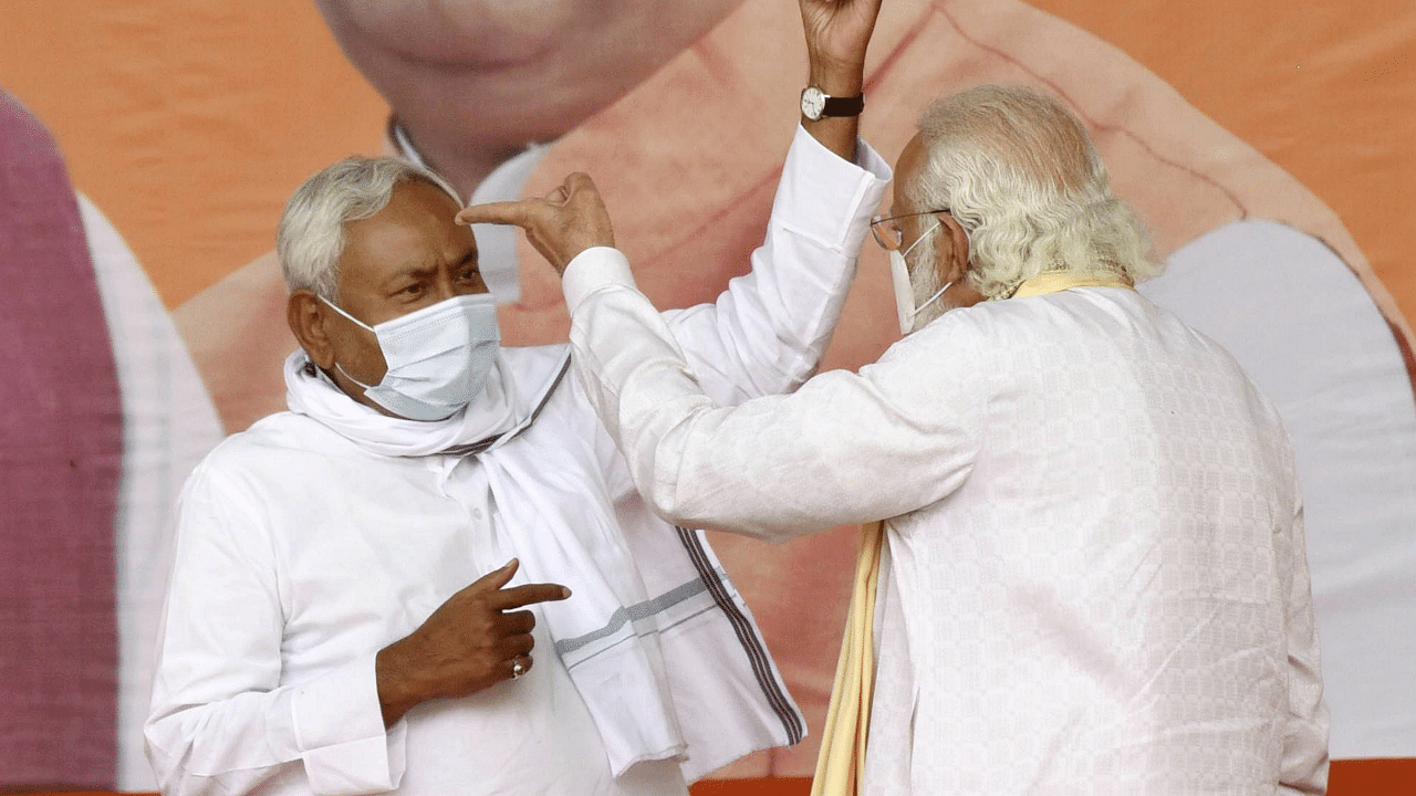 Prime Minister Narendra Modi with Bihar Chief Minister and Janata Dal (United) President Nitish Kumar during an election rally, in Sasaram. Credits: PTI Photo
