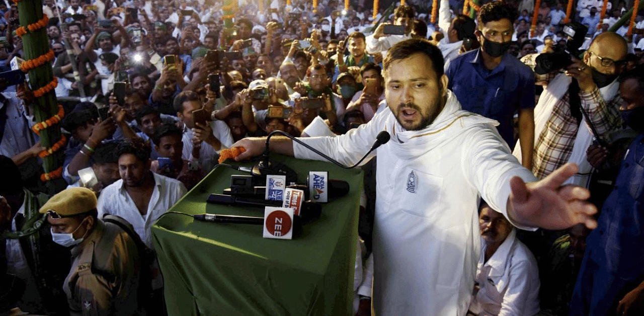 Vaishali: Rashtriya Janata Dal (RJD) leader Tejashwi Prasad Yadav addresses during a campaign for the second phase of Bihar Assembly polls, at Bidupur Raghopur in Vaishali district. Credit: PTI Photo