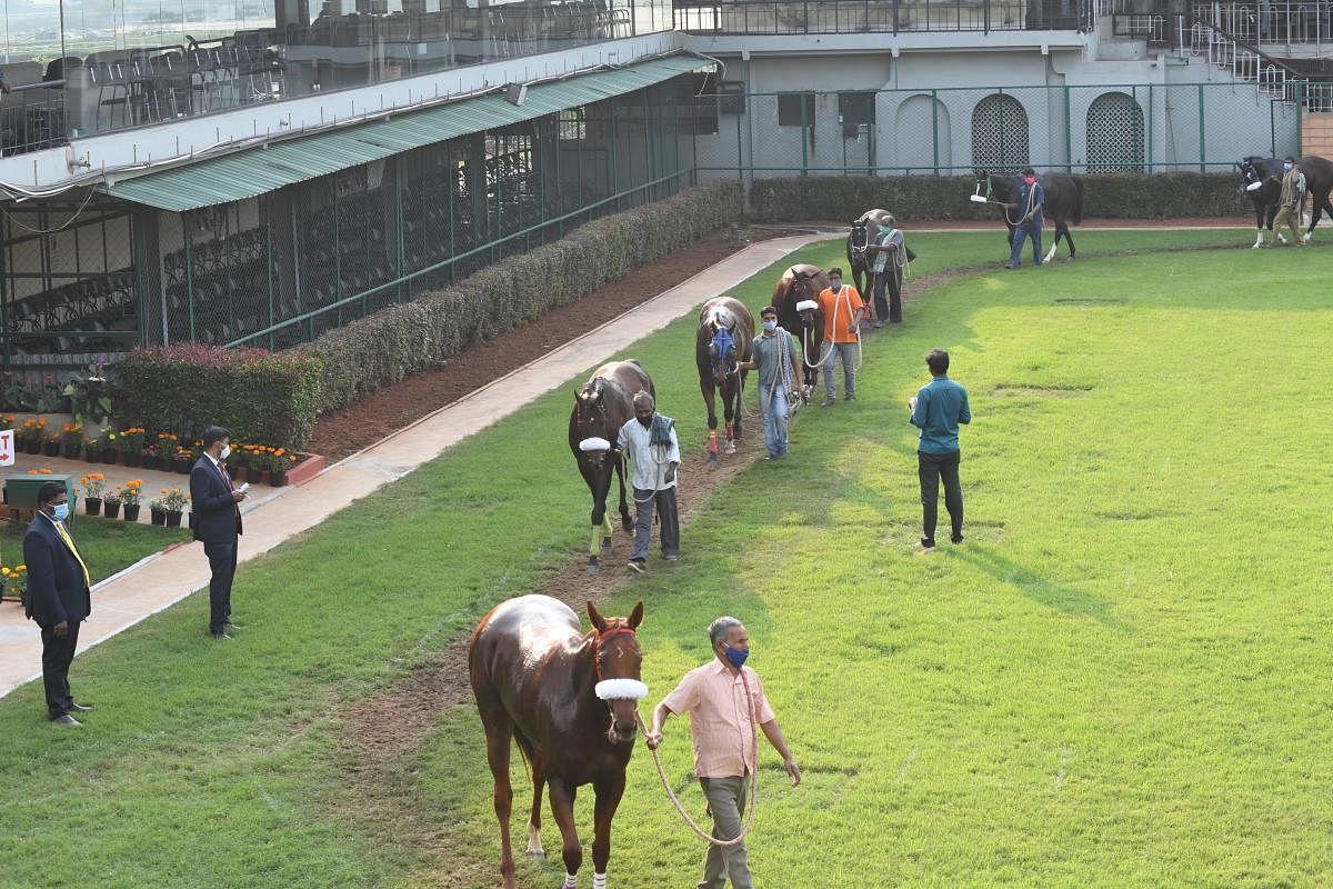 Absence of fans, social distancing, compulsory masks and constant sanitisation made for an unprecedented atmosphere at the BTC, but the racing fraternity was happy to resume activities after almost eight-month break. DH Photo/B H Shivakumar