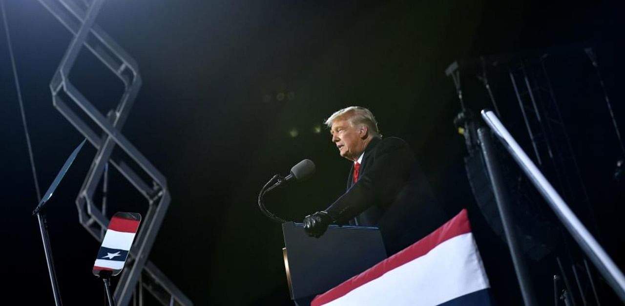 US President Donald Trump speaks during a rally at Williamsport Regional Airport in Montoursville. Credit: AFP.