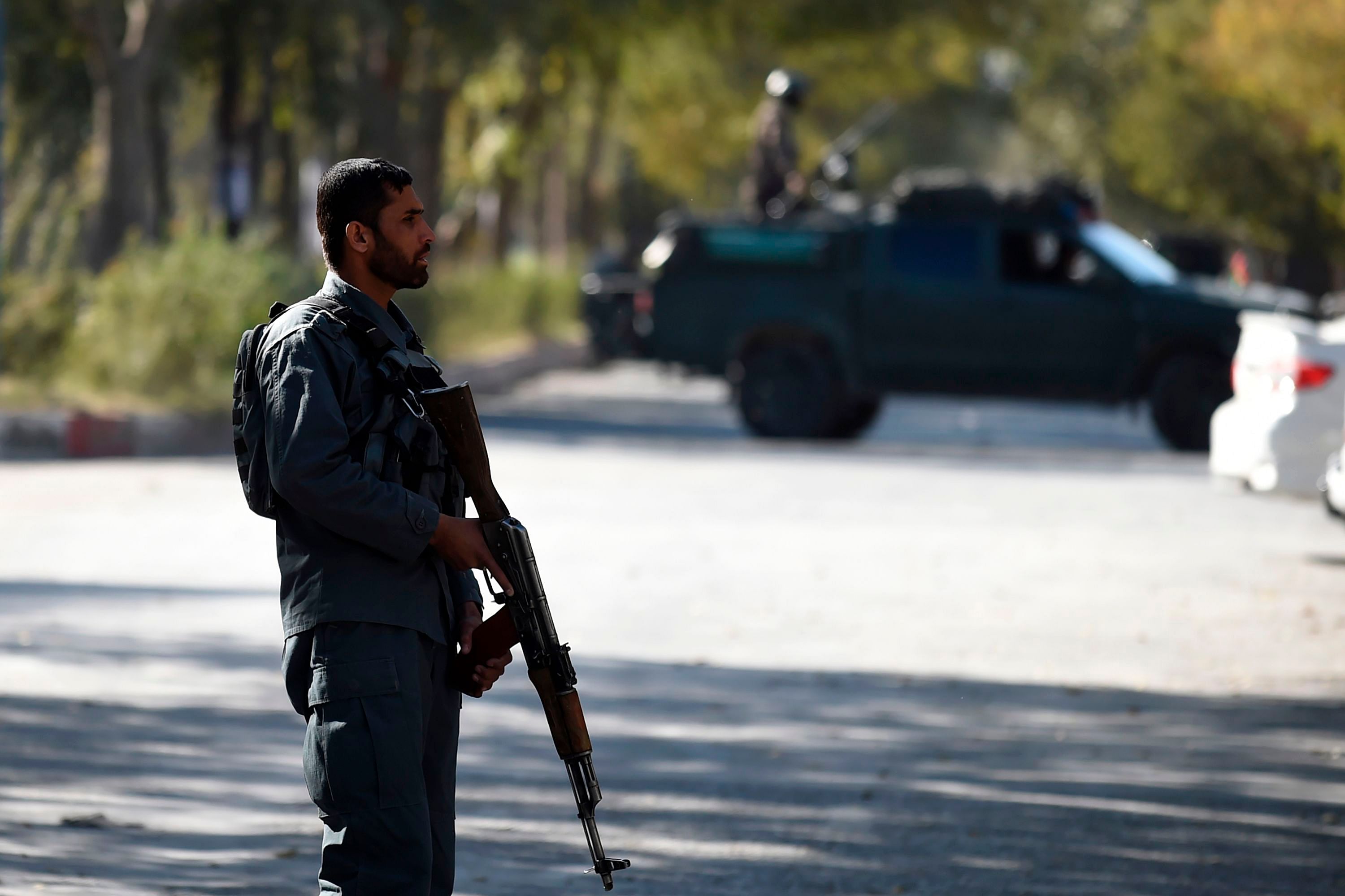 A security personnel stands guard outside the Kabul University in Kabul on November 2, 2020. - Gunmen stormed Kabul university on November 2 ahead of the opening of an Iranian book fair, firing shots and sending students fleeing, Afghan officials and witnesses said. Credit: AFP Photo