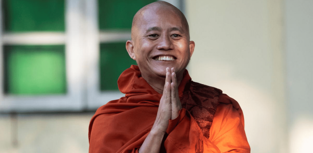 Fugitive Buddhist nationalist monk Wirathu hands himself in at a police station in Yangon, Myanmar. Credit: Reuters Photo