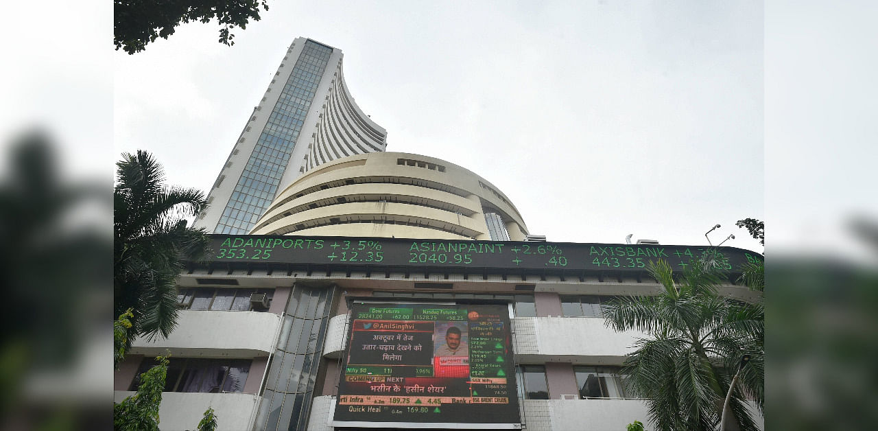 A screen on the facade of BSE building displays stock prices. Credit: PTI