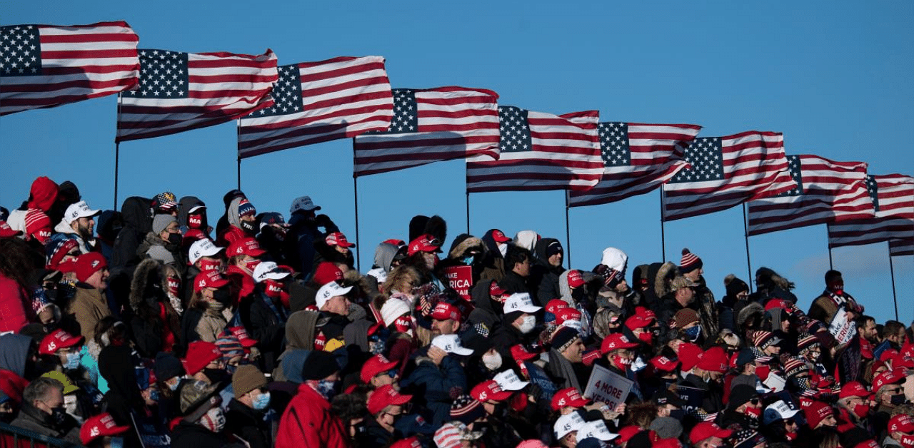 In and around polling places across the country, reminders of a 2020 election year shaped by pandemic, civil unrest and bruising political partisanship will greet voters, although more than 90 million ballots have been already submitted in an unprecedented wave of early voting. Credit: AFP