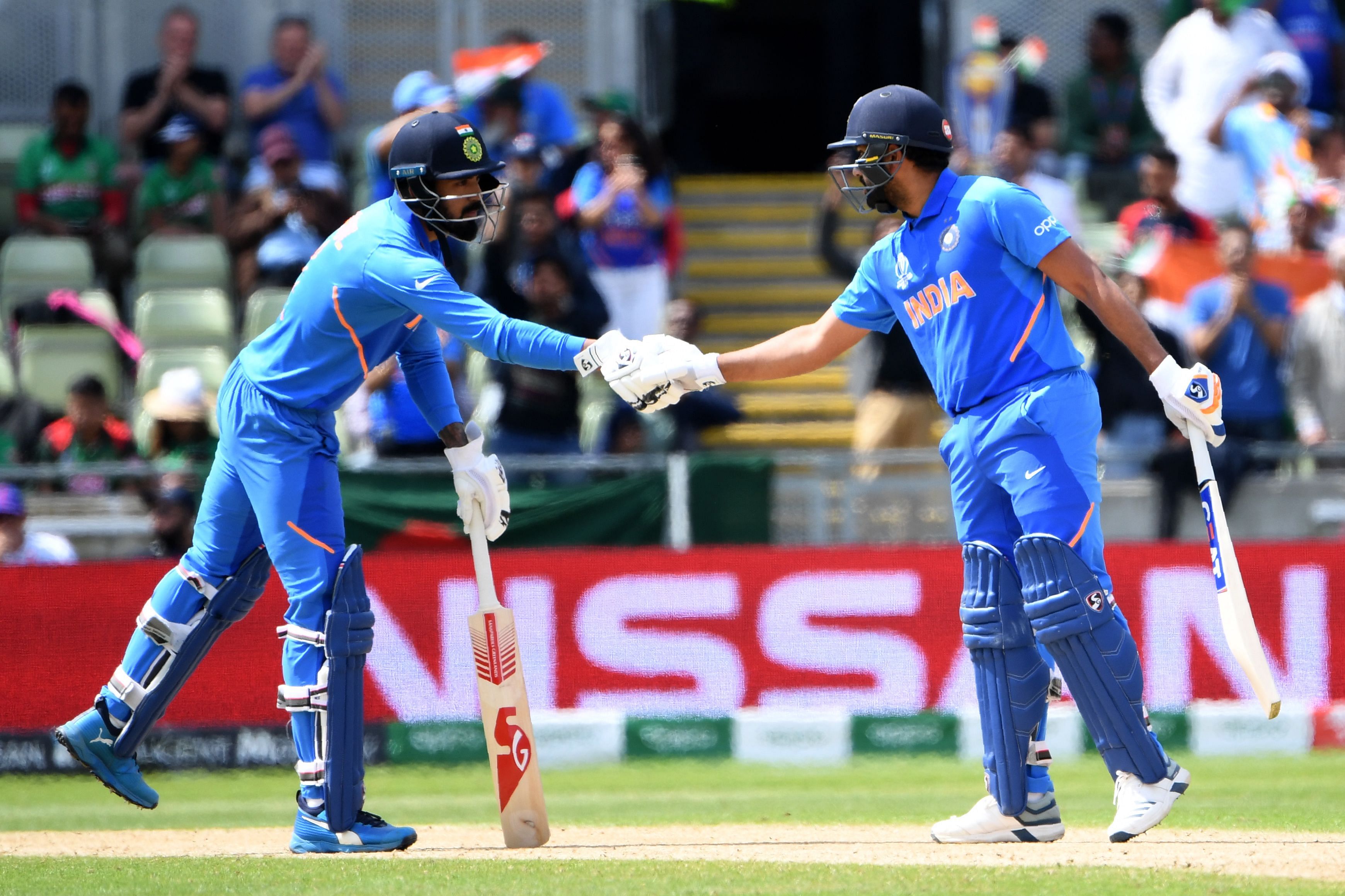 ndia's Rohit Sharma (R) celebrates reaching his 50 with India's K.L. Rahul during the 2019 Cricket World Cup. Credit: AFP Photo