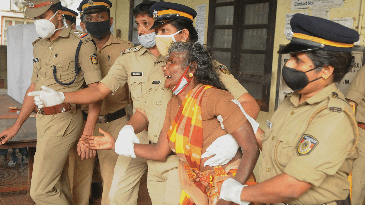 Kannammal mother of Maoist Velmurukan, who was killed in an exchange of fire with a police team during a search operation at Bhaskaran para, cries in front of the mortuary at Medical College in Kozhikode. Credits: PTI Photo