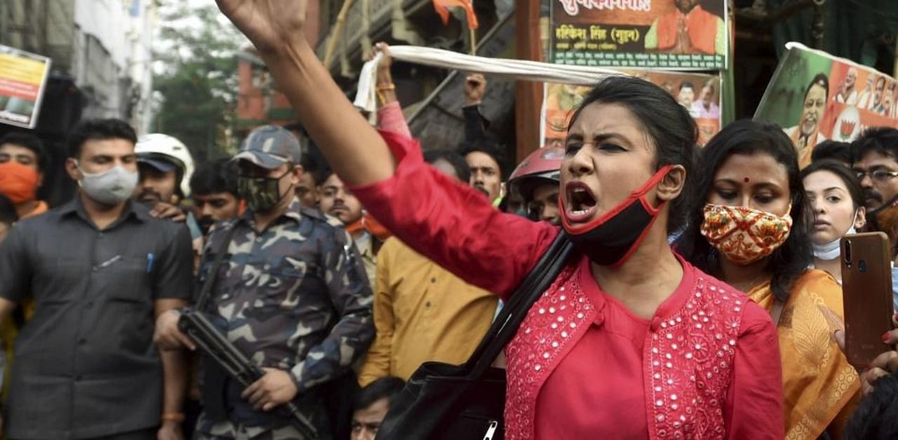 Members of Bharatiya Janata Yuva Morcha stage a demonstration against the state government over the law and order situation in West Bengal, in Kolkata, Wednesday, Nov. 4, 2020. (PTI Photo)