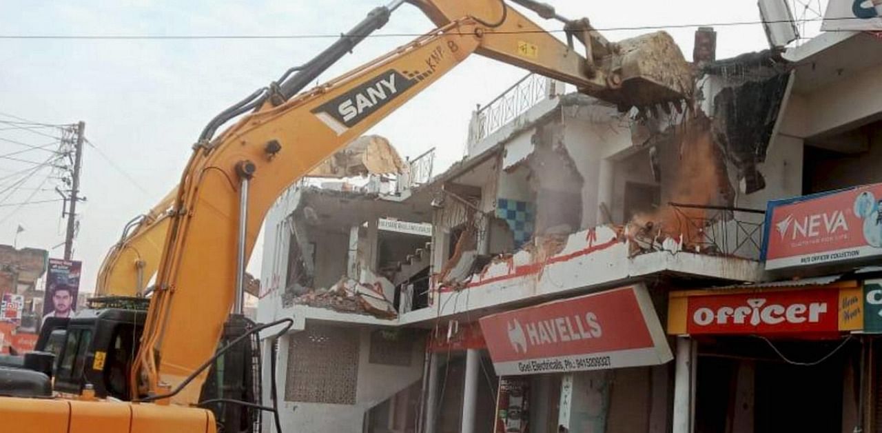 Authorities demolish an illegal building allegedly belonging to gangster-turned-politician Mukhtar Ansari, during an anti-encroachment drive, in Ghazipur. Credit: PTI/file photo.
