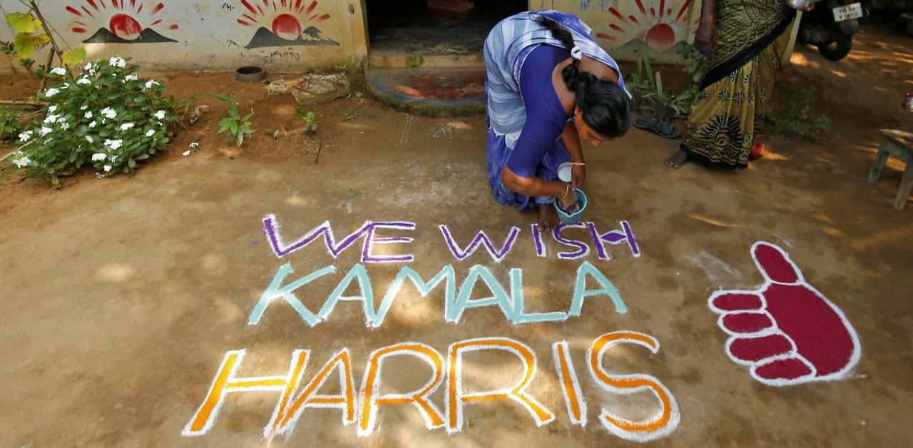 The village has also been decked out in posters of Harris, with prayers offered at the temple. Credit: Reuters Photo