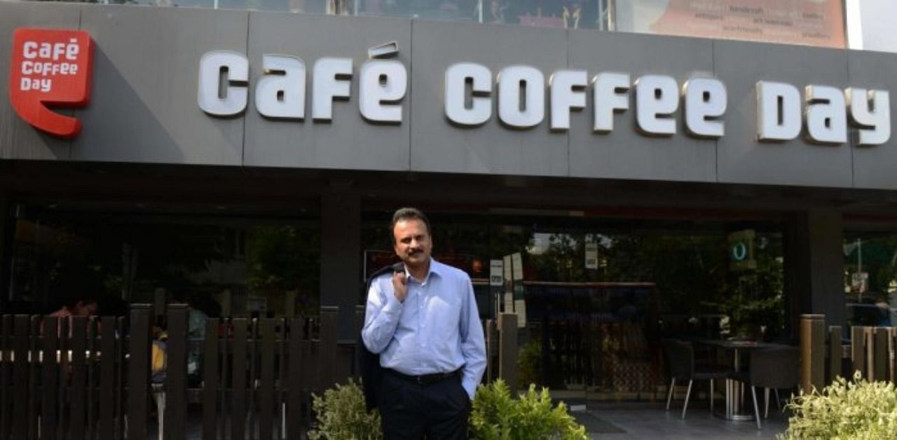 In this file photo taken on October 8, 2015 coffee tycoon V.G. Siddhartha, owner of the Café Coffee Day chain, poses for a photograph at one of his coffee shops in Ahmedabad. Credit: AFP Photo