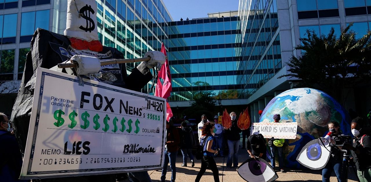 Activists take part in a protest led by shutdownDC the day after the 2020 US presidential election in Washington. Credit: Reuters Photo