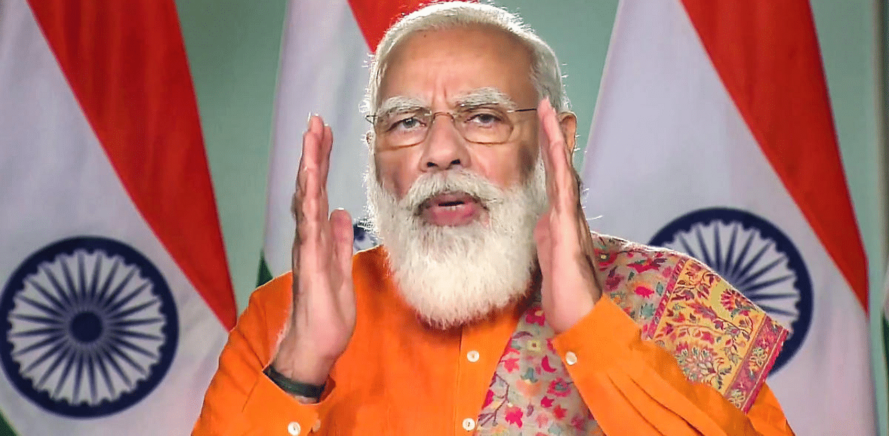 Overworked drivers can cause accidents, Modi said during an interaction with people via video conferencing. Credit: PTI Photo