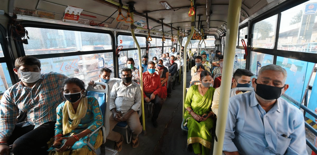Passengers occupy all seats in a DTC bus, in New Delhi. Credit: PTI Photo