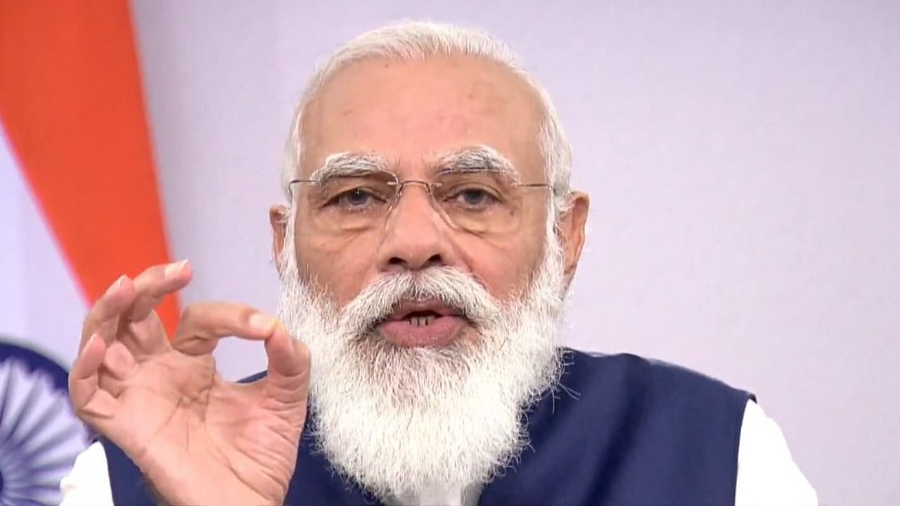 Modi hailed the move as a success, saying the surprise move had helped reduce black money, increase tax compliance and gave a boost to transparency. Credit: Twitter/BJP.