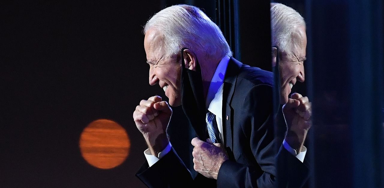 US President-elect Joe Biden gestures to the crowd after he delivered remarks in Wilmington, Delaware. Credit: AFP Photo