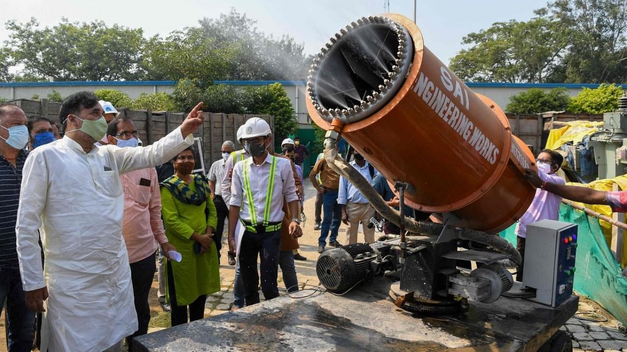 Intensifying water sprinkling and use of anti-smog guns at pollution hotspots, were among the immediate measures suggested by the commission. Credit: AFP