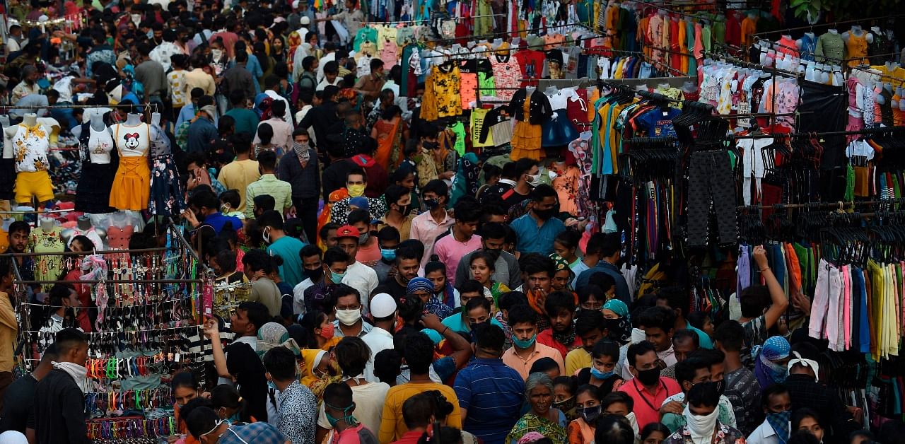 Shoppers throng a market area between Teen Darwaja and Bhadrakali Temple ahead of Diwali. Credit: AFP Photo