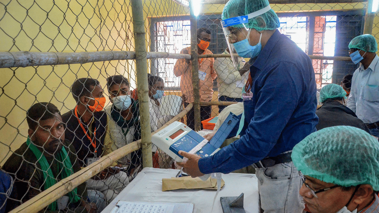 Election officials count votes at a centre on counting day of Bihar Assembly polls. Credits: PTI Photo