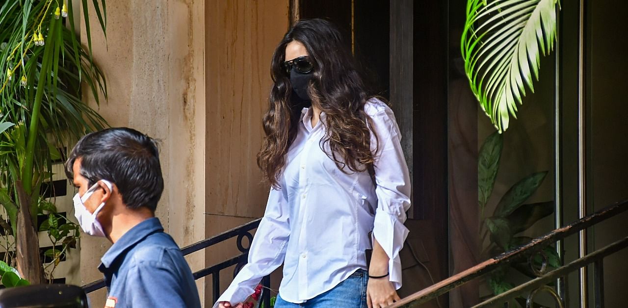 Gabriella Demetriades, girlfriend of Bollywood actor Arjun Rampal, leaves for NCB office after being summoned by the agency in connection with a drug case, in Mumbai. Credit: PTI Photo
