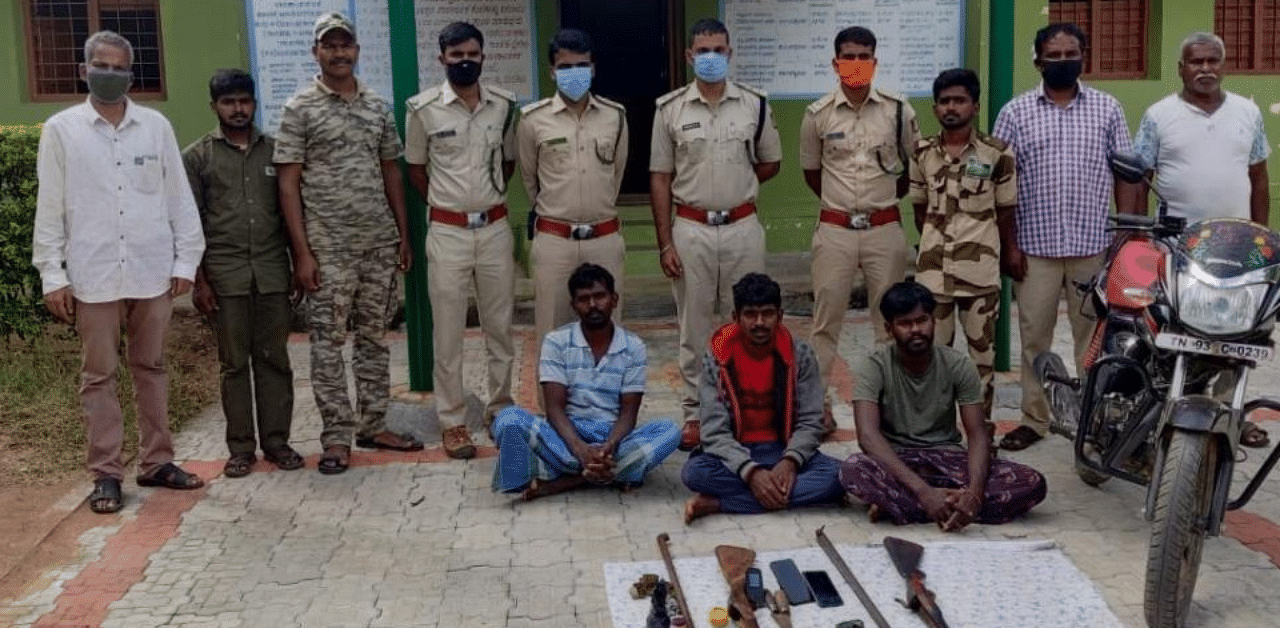 Two country rifles, one two-wheeler, battery, two knives and bullets were recovered from them. Credit: DH Photo