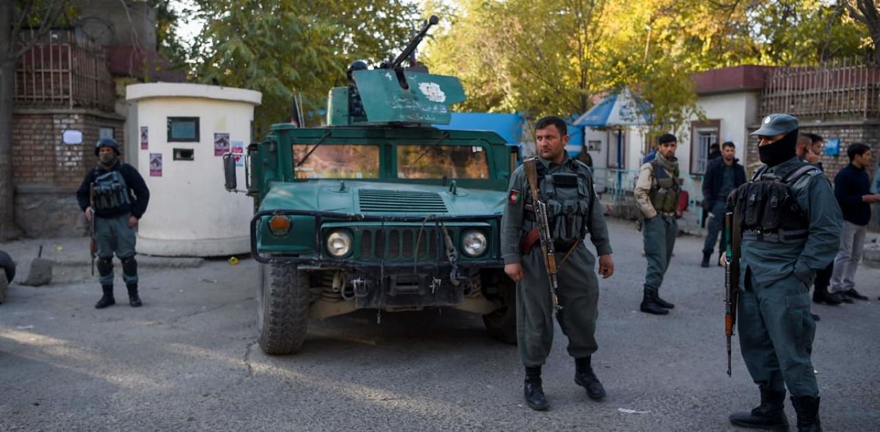 Afghan forces outside Kubul university. Credit: AFP Photo