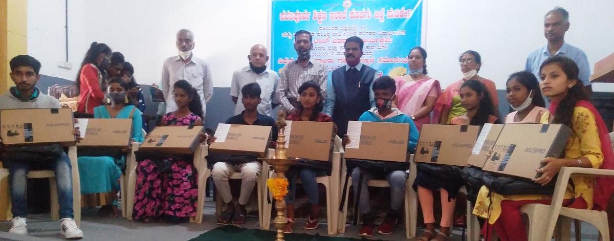 Laptops were distributed to the meritorious students in Madikeri.