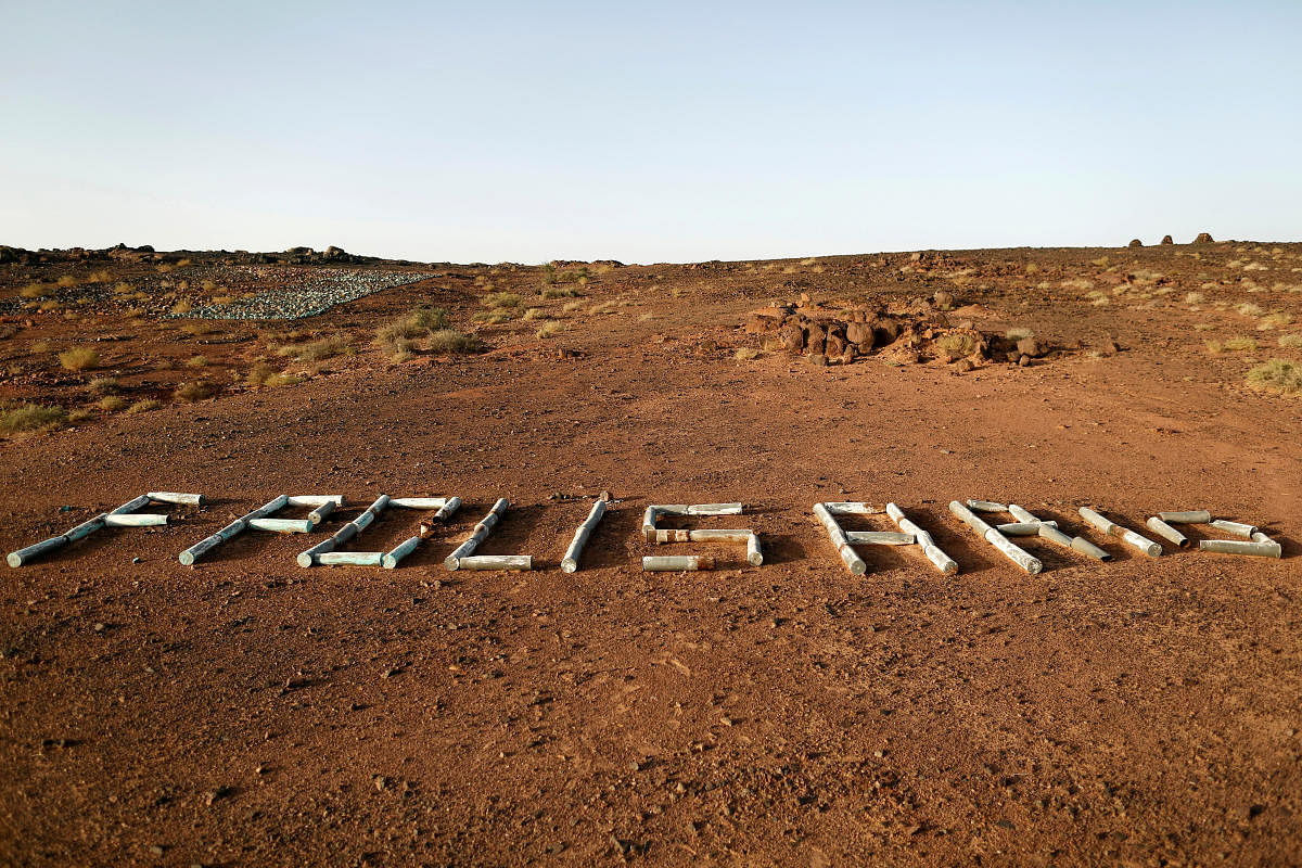 The word Polisario is seen on the ground in Tifariti, Western Sahara, September 9, 2016. Credit: REUTERS