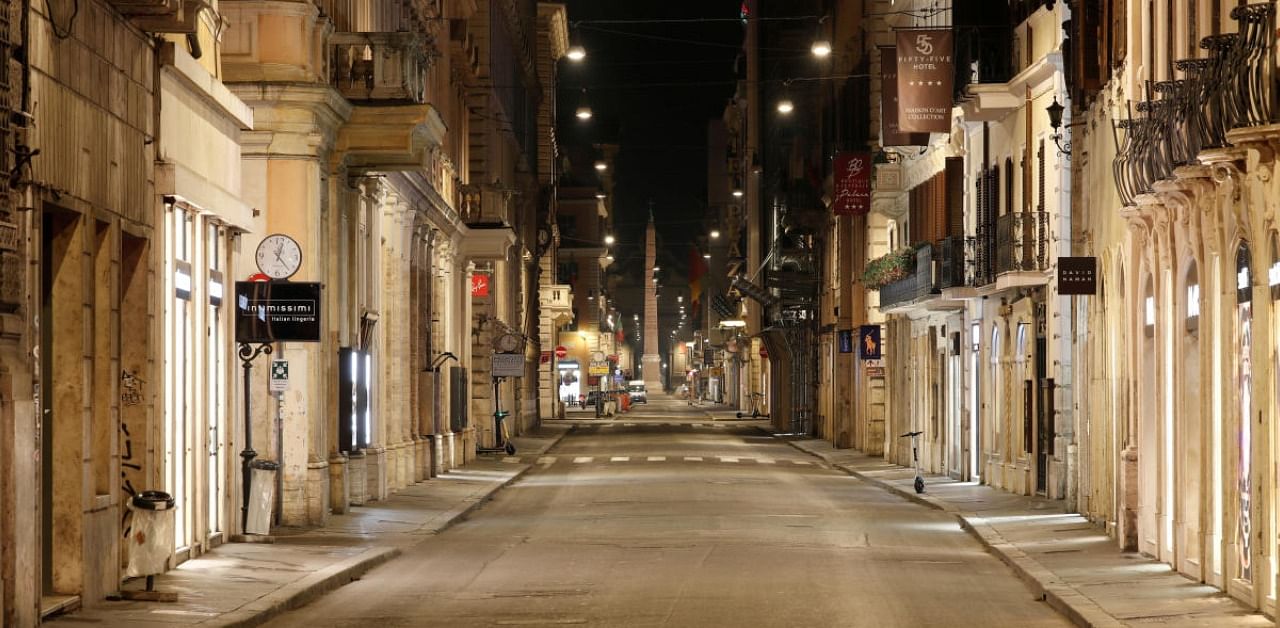 An empty Via del Corso street in Rome. Credit: Reuters Photo