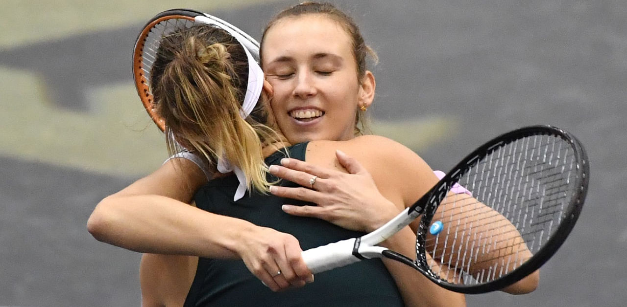 Winner Aryna Sabalenka (L) from Belarus is congratulated by second placed Belgium's Elise Mertens at the end of the final match of the WTA Upper Austria Ladies tennis tournament on November 15, 2020 in Linz. Credit: AFP Photo