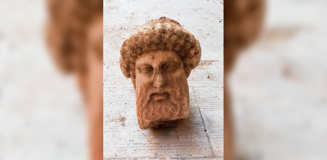 Head of an ancient statue of the Greek god Hermes, in Athens, which has been unearthed during excavations for sewage system improvements in central Athens, the ministry of culture said. Credit: AFP Photo