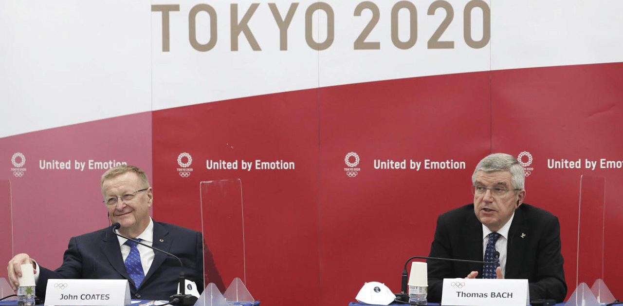 International Olympic Committee President Thomas Bach, right, and Chairman of the IOC's Coordination Commission for the Tokyo 2020 Olympic Games John Coates. Credit: AP Photo