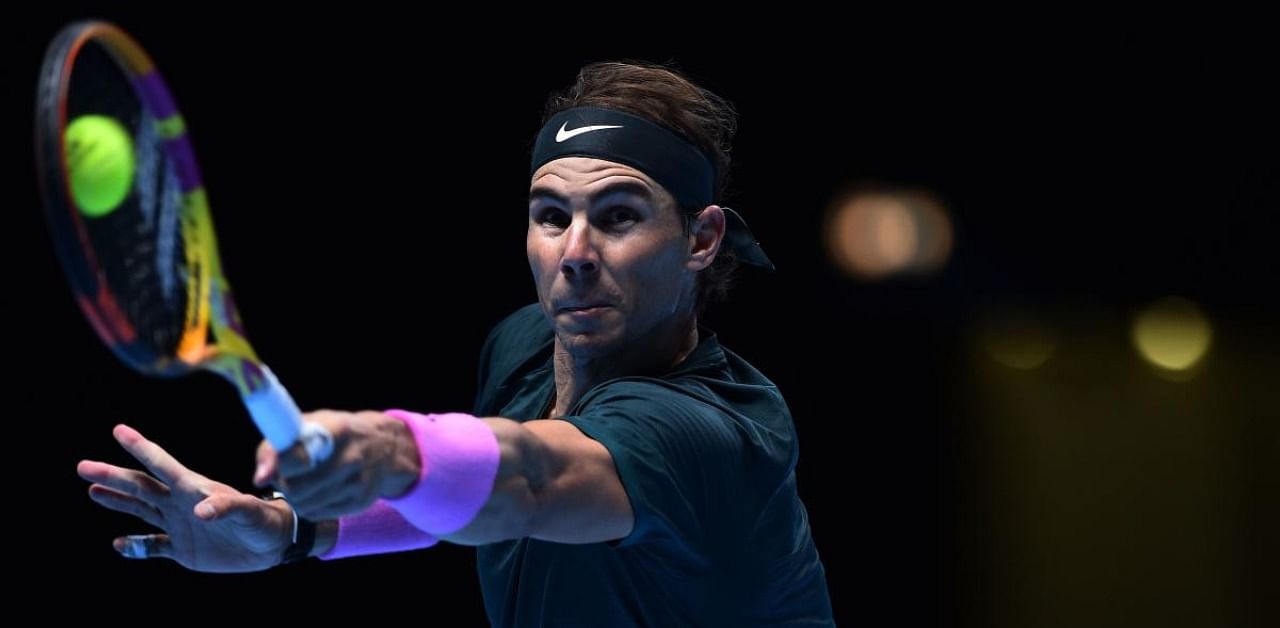 Spain's Rafael Nadal returns against Russia's Andrey Rublev in their men's singles round-robin match on day one of the ATP World Tour Finals tennis tournament. Credit: AFP