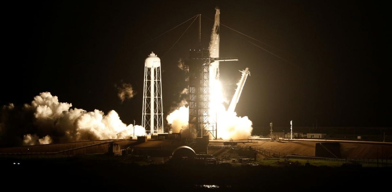 A SpaceX Falcon 9 rocket, topped with the Crew Dragon capsule, is launched carrying four astronauts on the first operational NASA commercial crew mission at Kennedy Space Center in Cape Canaveral, Florida. Credit: Reuters