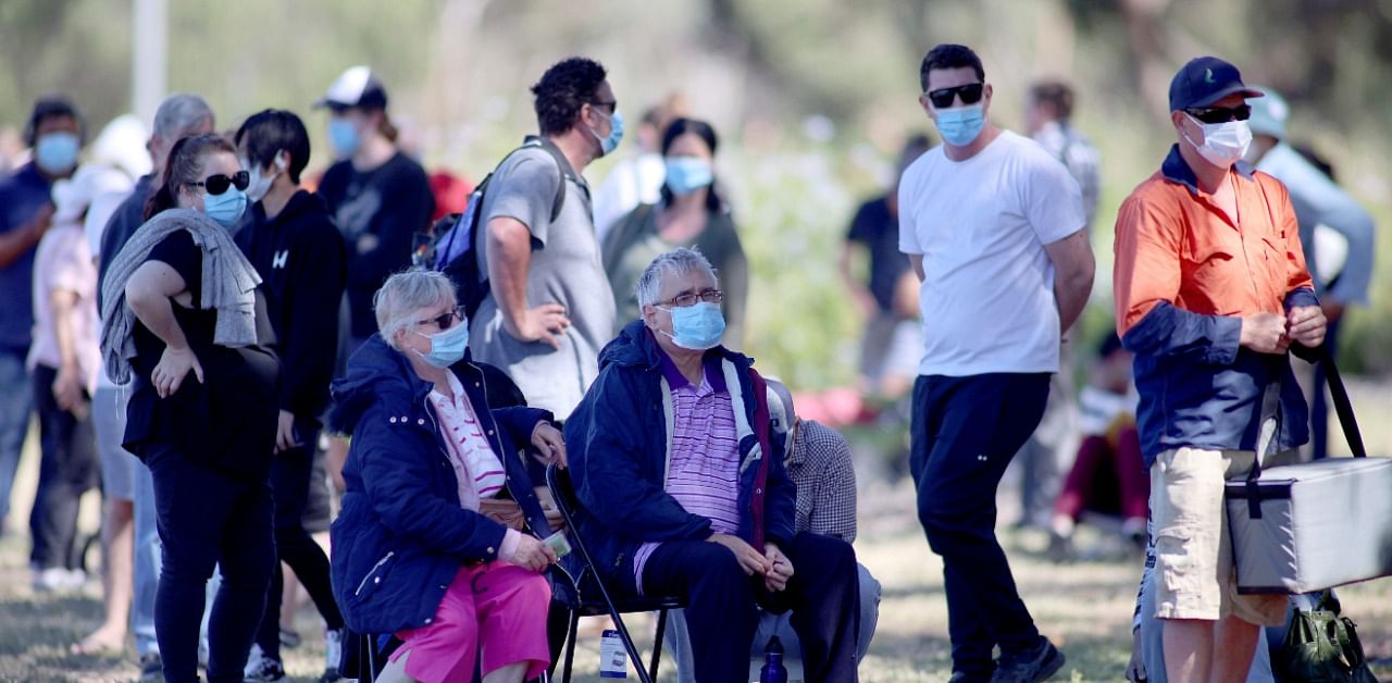 People are seen queuing at a coronavirus disease testing site as the state of South Australia experiences an outbreak, in Adelaide, Australia. Credit: Reuters Photo