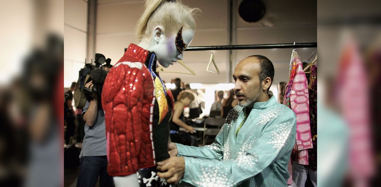  A model prepares backstage before the Manish Arora Fashion show as part of London Fashion Week Spring/Summer 2007 in the BFC tent on September 18, 2006 in London. Credit: MJ Kim/Getty Images