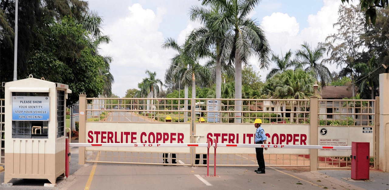 A private security guard stands in front of the main gate of Sterlite Industries Ltd's copper plant in Tuticorin. Credit: Reuters file photo. 