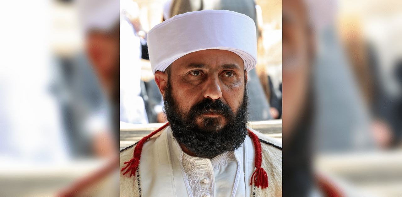 Baba Sheikh Ali Alyas, the new supreme spiritual leader of the Yazidi religious minority, attends his inauguration ceremony at the Lalish temple situated in a valley near Dohuk, 430 kilometres (260 miles) northwest of the Iraqi, capital on November 18, 2020. Credit: AFP Photo
