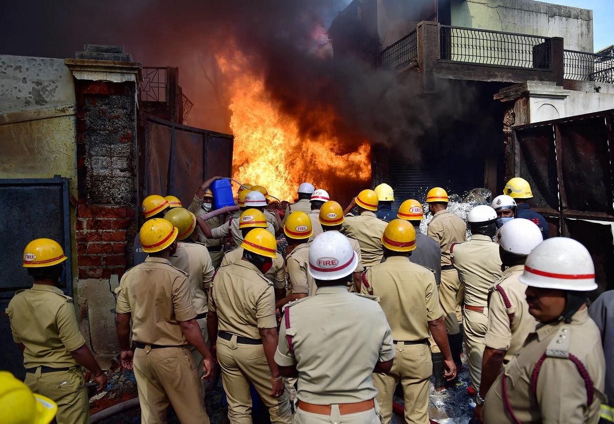 Bengaluru: Fire fighters try to douse a fire which broke out in a chemical factory, in Bengaluru, Tuesday, Nov. 10, 2020. (PTI Photo/Shailendra Bhojak) (PTI10-11-2020_000089A)