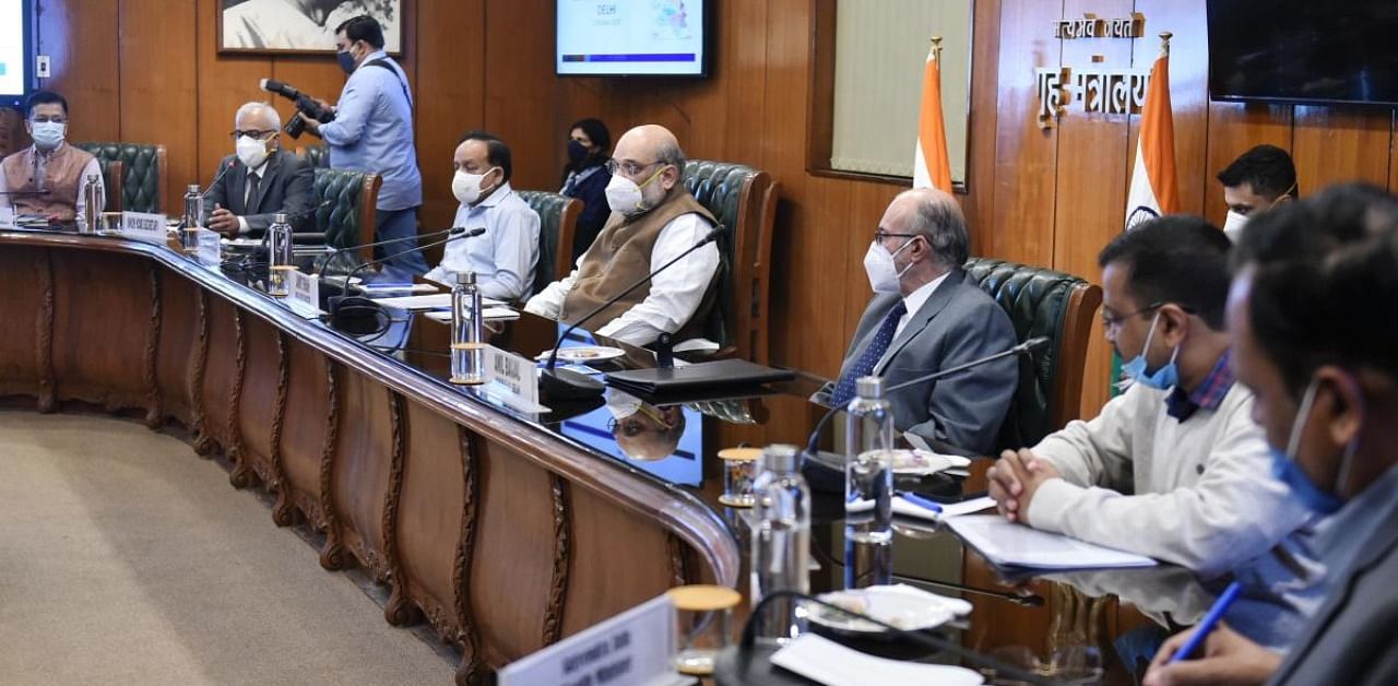 Home Minister Amit Shah chairs a meeting over the Covid-19 situation in the national capital. Credit: PTI Photo