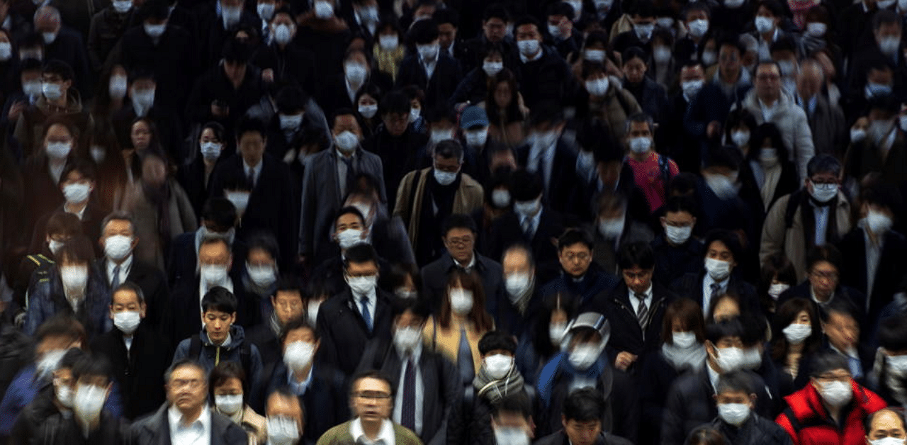 Crowds wearing protective masks, during the coronavirus disease (COVID-19) outbreak, are seen at Shinagawa station in Tokyo, Japan, March 2, 2020. Credit: Reuters Photo