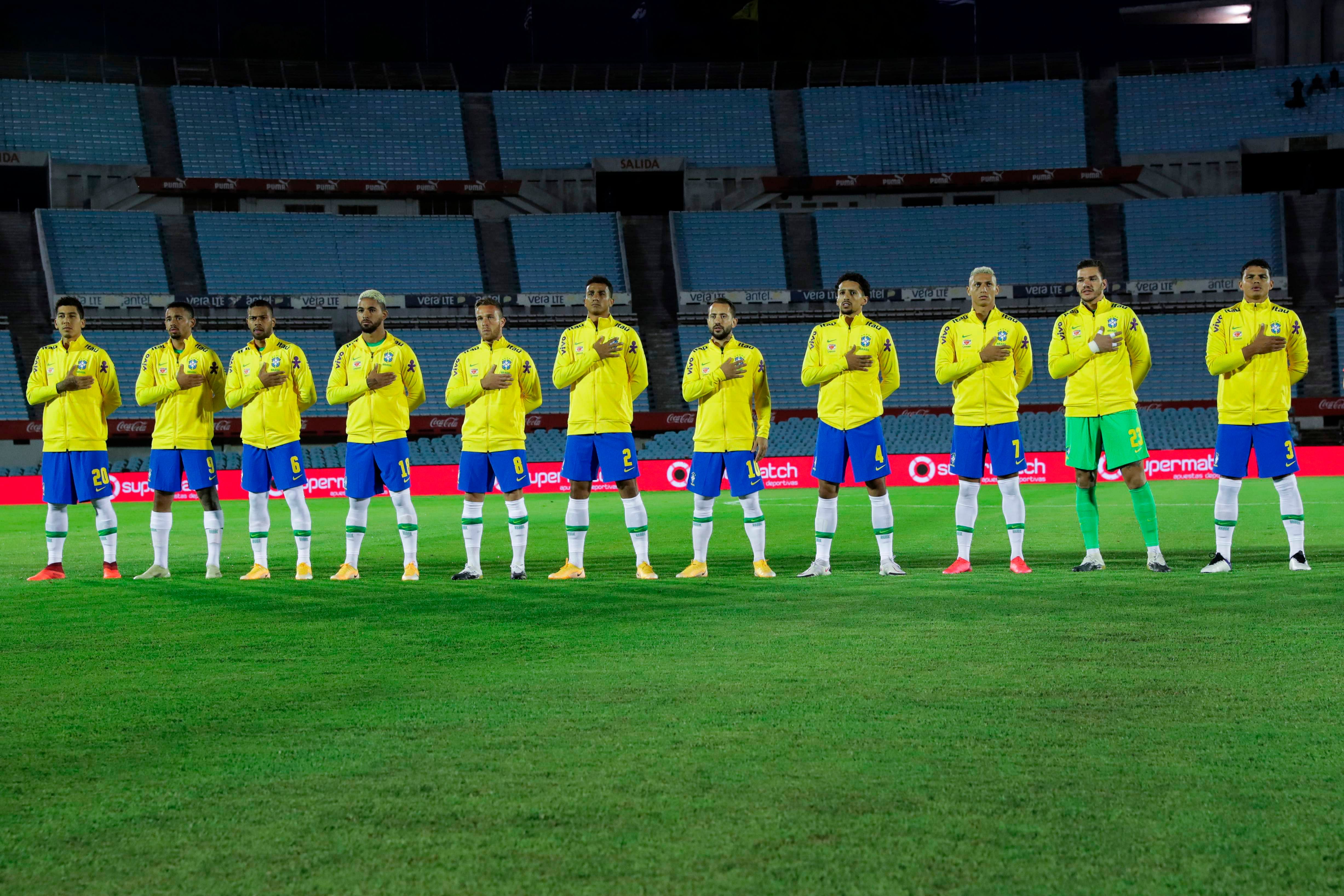 Brazil listen to their national anthem before the closed-door 2022 FIFA World Cup South American qualifier football match against Uruguay. Credit: AFP Photo