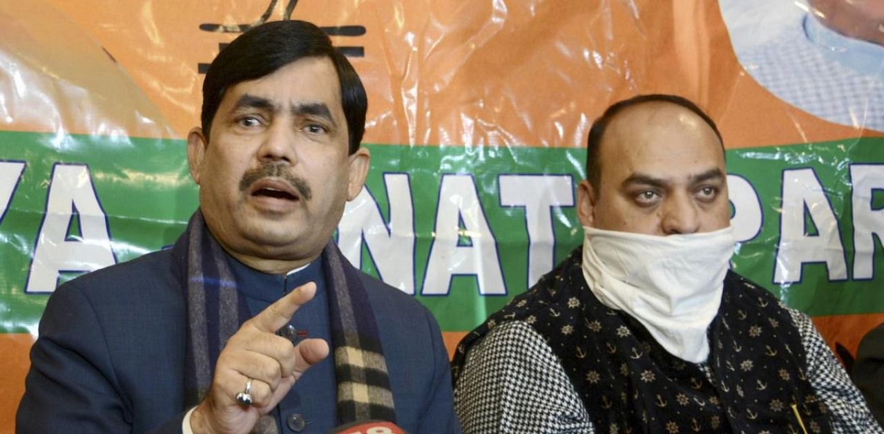 Bharatiya Janata Party (BJP) National spokesperson Shahnawaz Hussain along with senior party leaders ahead of DDC elections. Credit: PTI Photo