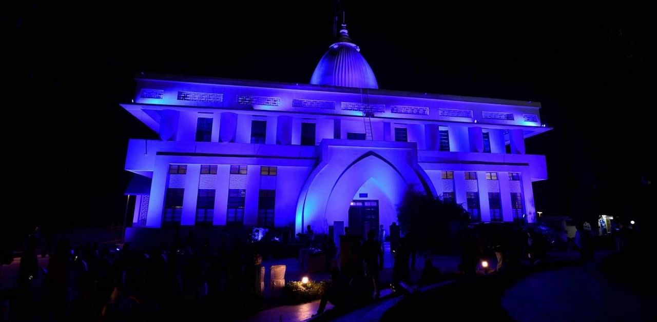 Gandhi Mandap illuminated in blue on World Children’s Day, in Guwahati. Credit: PTI.