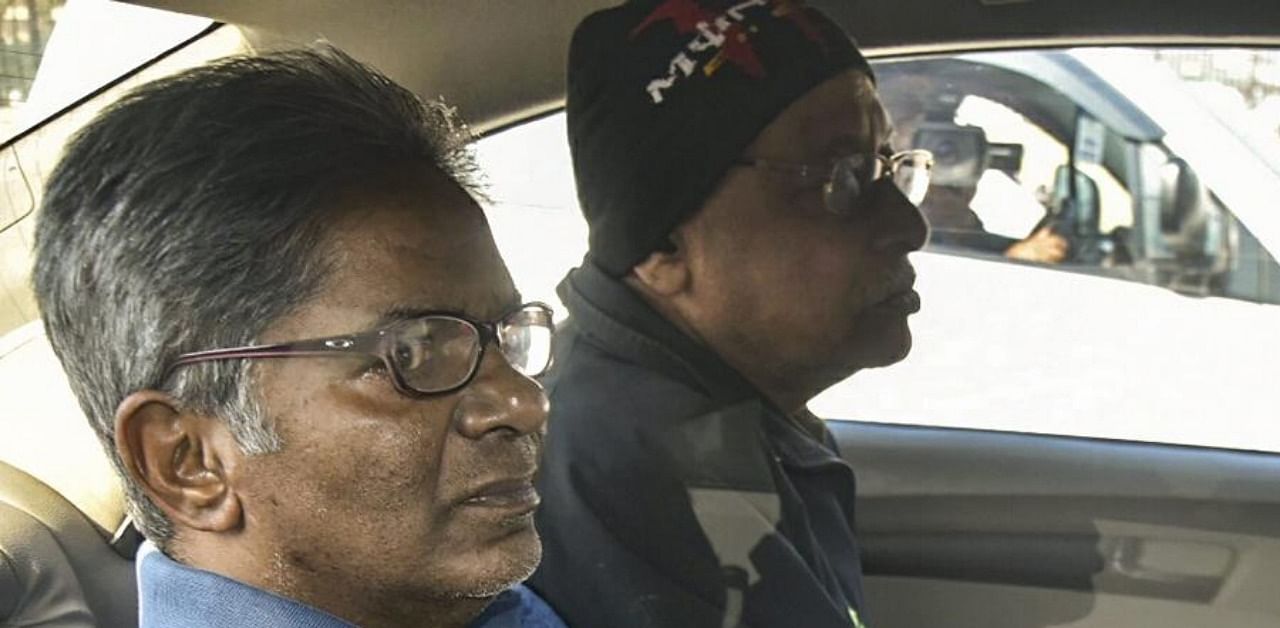 Rajiv Saxena (Left) is a key accused in the case. Credit: PTI file photo.