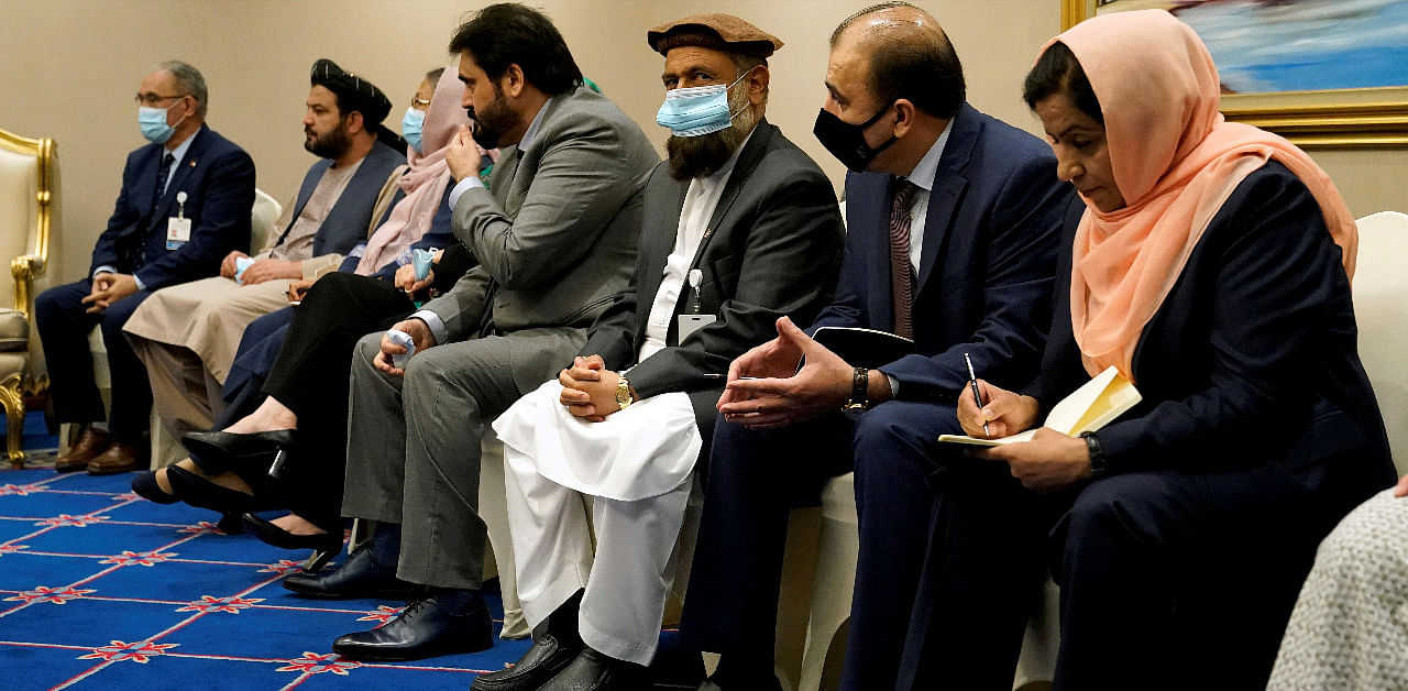 Members of peace negotiation team of the Islamic Republic of Afghanistan attend a meeting with U.S. Secretary of State Mike Pompeo. Credit: Reuters Photo