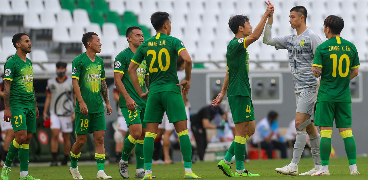 Beijing's players celebrate their win during the AFC Champions League group E football match between Korea's FC Seoul and China's Beijing Guoan. Credit: AFP Photo