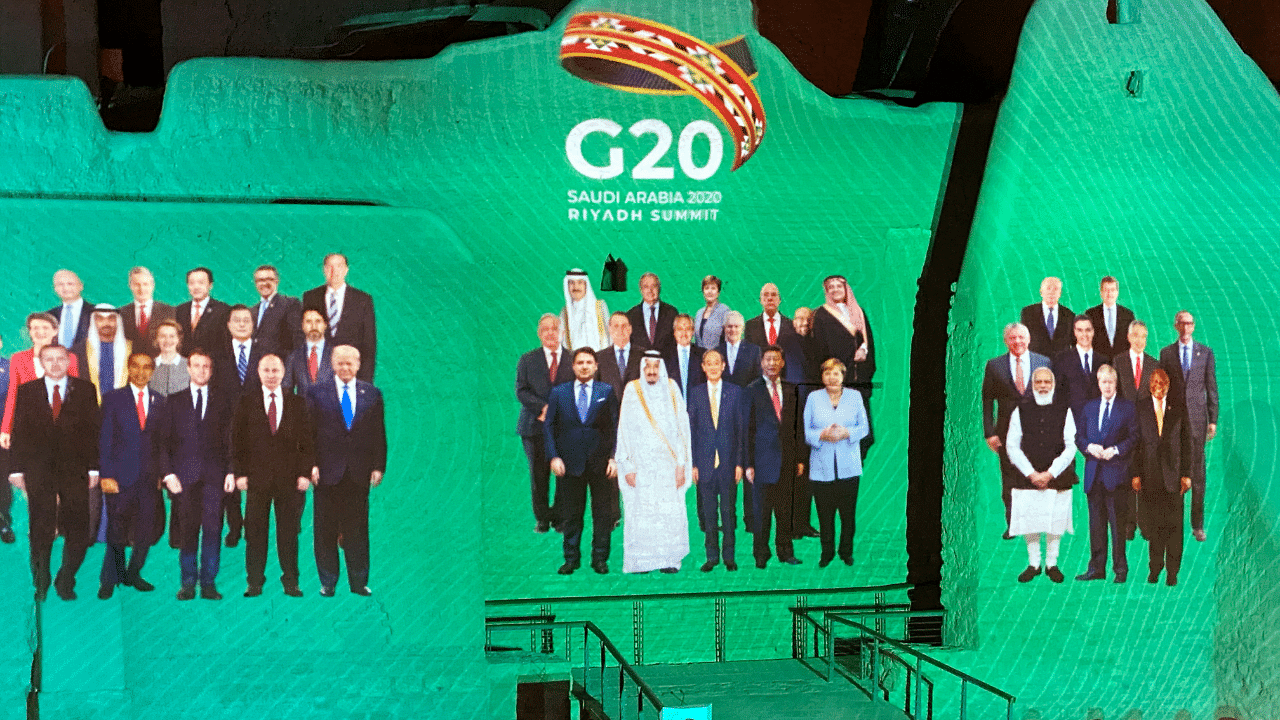 "Family Photo" for annual G20 Summit World Leaders is projected onto Salwa Palace in At-Turaif, one of Saudi Arabia’s UNESCO World Heritage sites, in Diriyah. Credit: Reuters Photo
